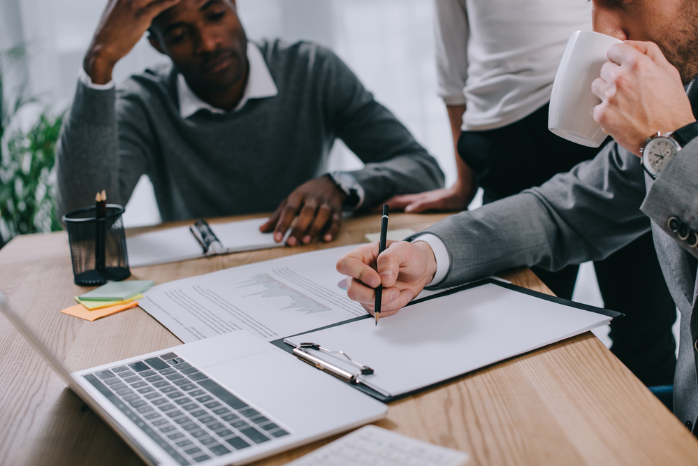 A New York Workers' Compensation lawyer works with a client to file a claim